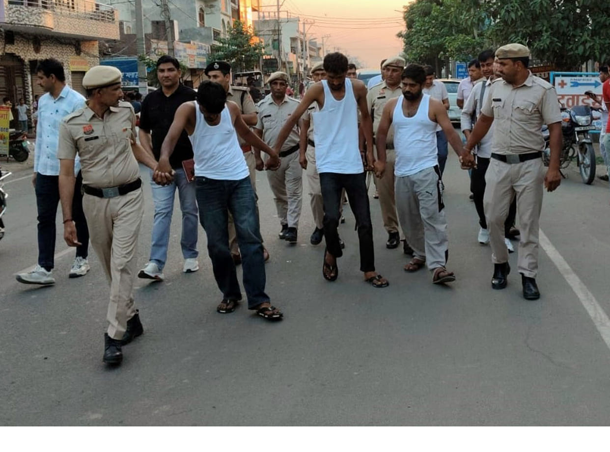Three accused arrested for fatally attacking a mechanic, police conducted a foot parade