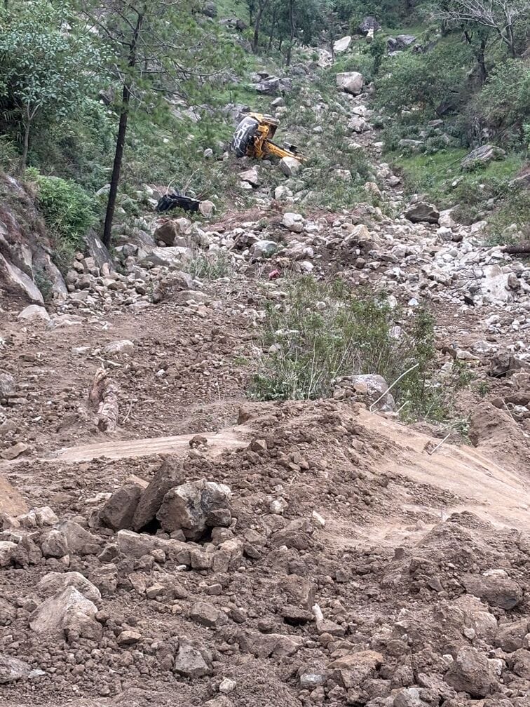 A truck capsized in Kotli, and a machine fell into a ditch, injuring the operator.