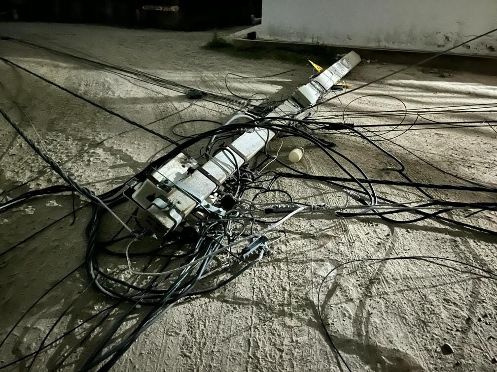 Three electric poles were broken after being hit by a truck