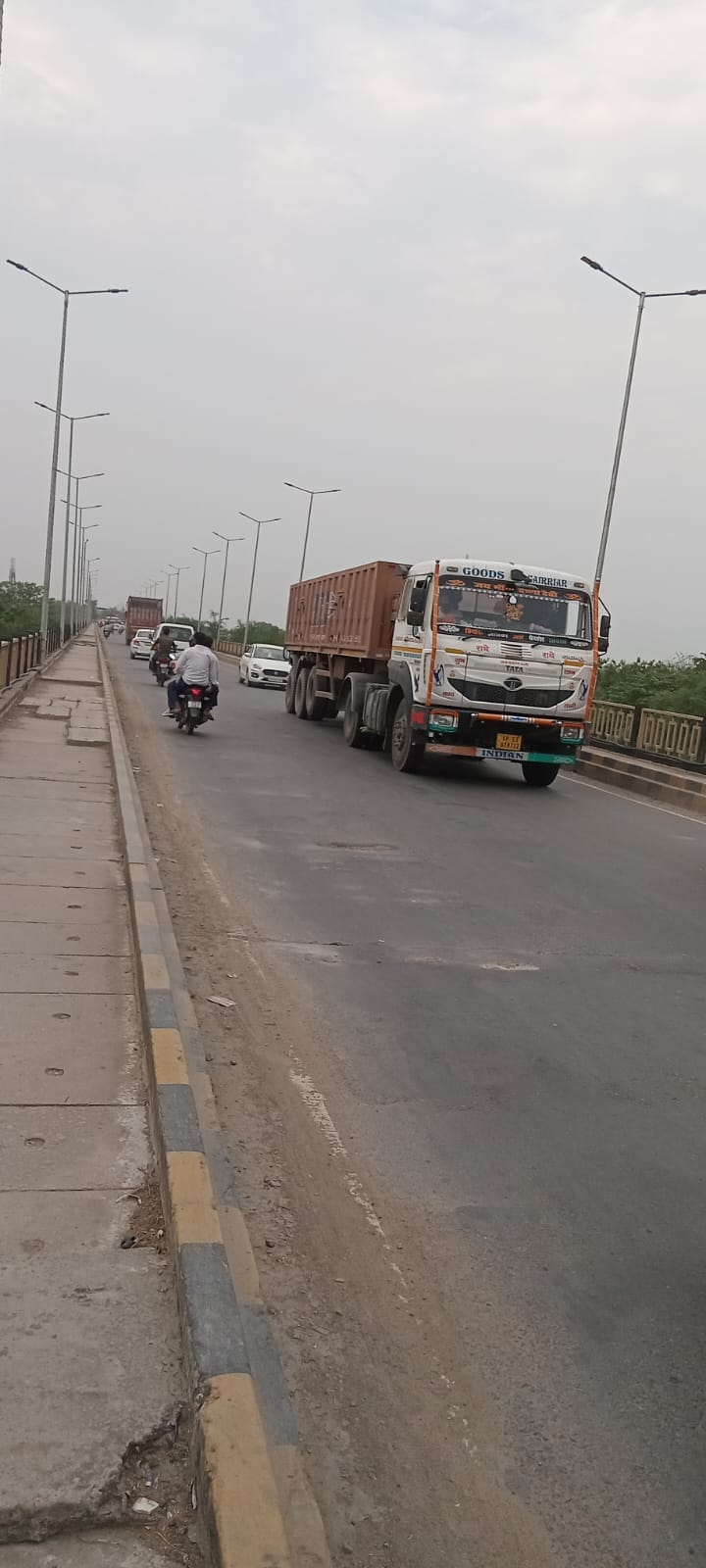 Despite the ban, heavy vehicles are passing through Dohrighat bridge indiscriminately.