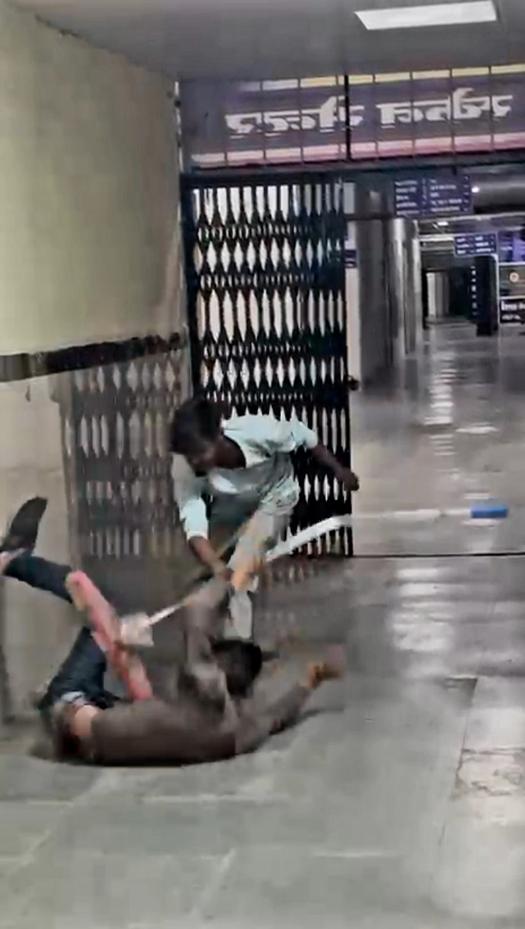 Two brothers clashed in the isolation ward of the district hospital, kicking their mother in the face