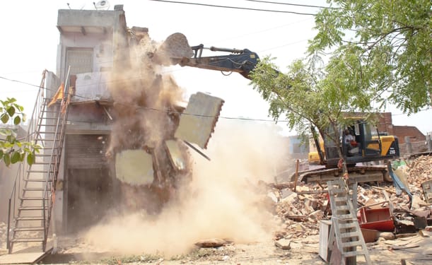 Bulldozers razed 250 houses in Nehru Colony