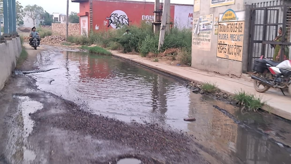 Due to lack of drainage system, the road got damaged due to waterlogging.