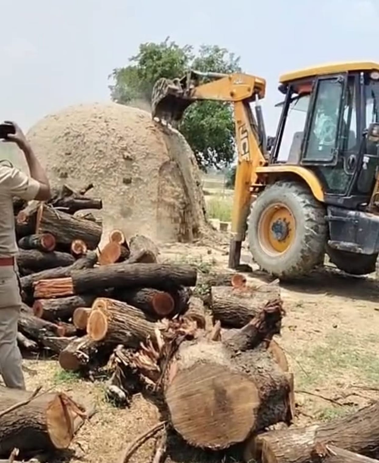 Bulldozers run on illegal coal furnaces