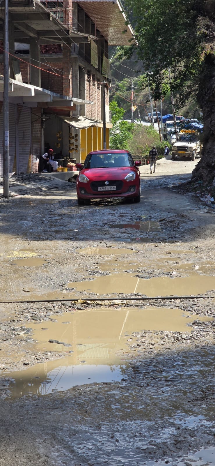 Near Nerwa bus stand, 500 meters of road was left unpaved, people were troubled
