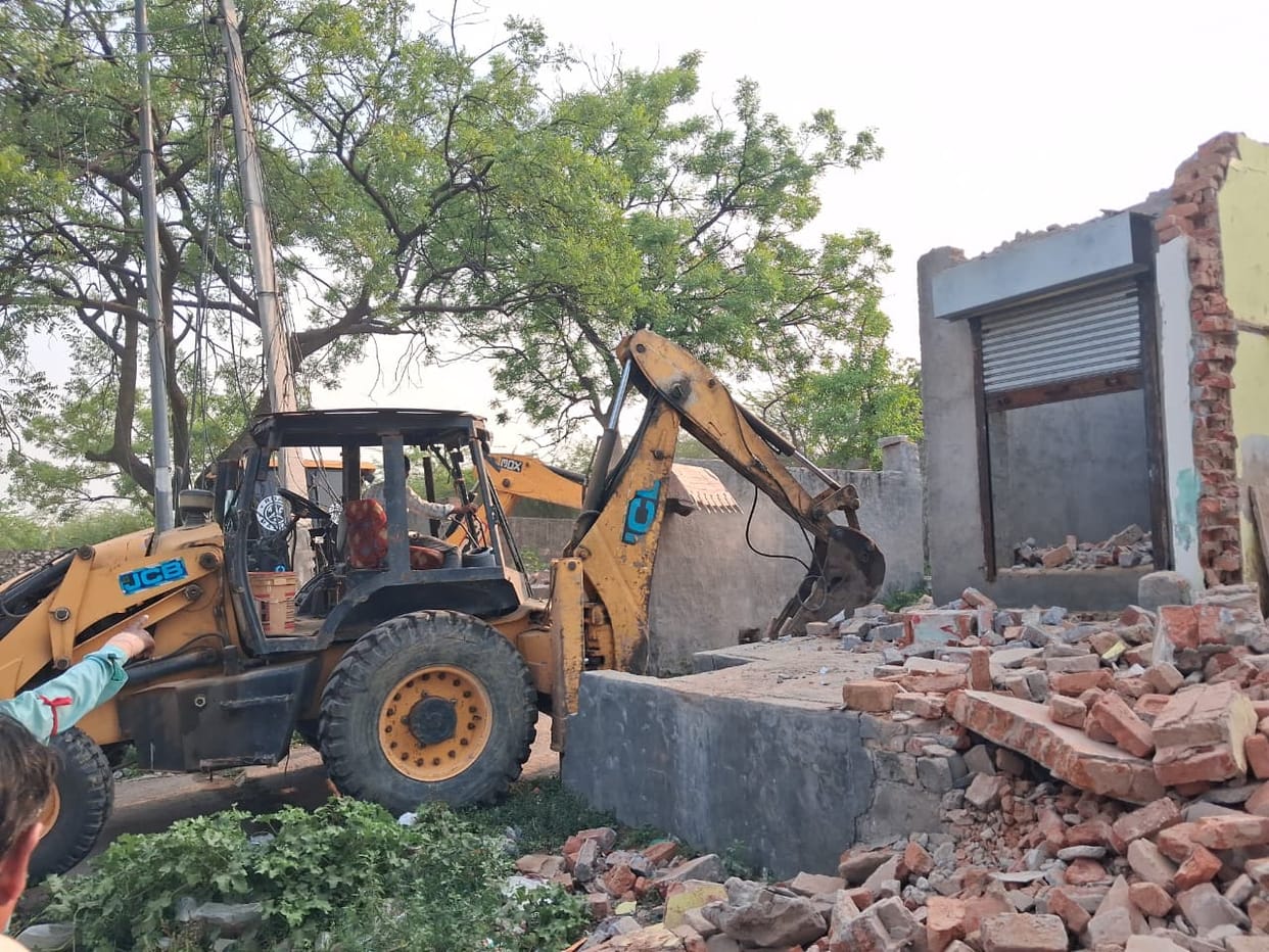 Bulldozer used to free tourism department's land from encroachment in Sohna