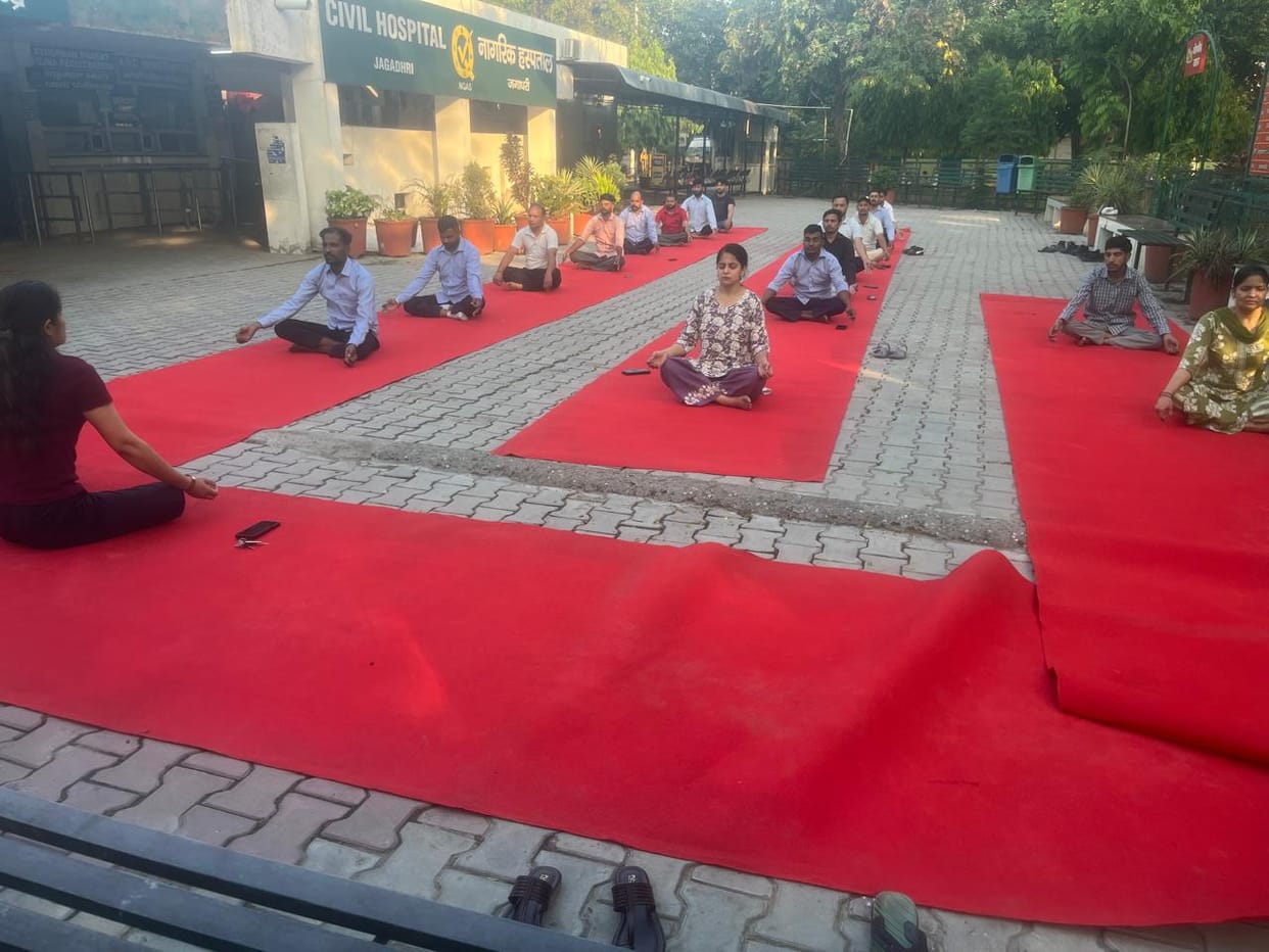 Doctors, staff, patients and attendants performed yoga.