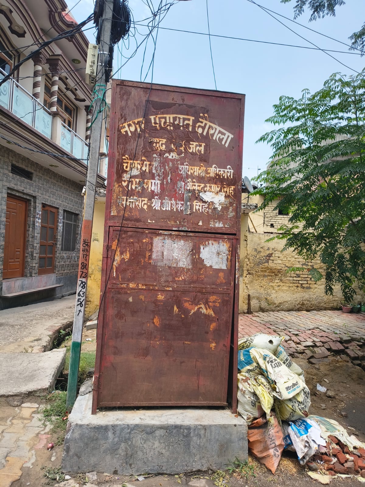 Water coolers fail to quench thirst, with many broken and others filled with dirt.