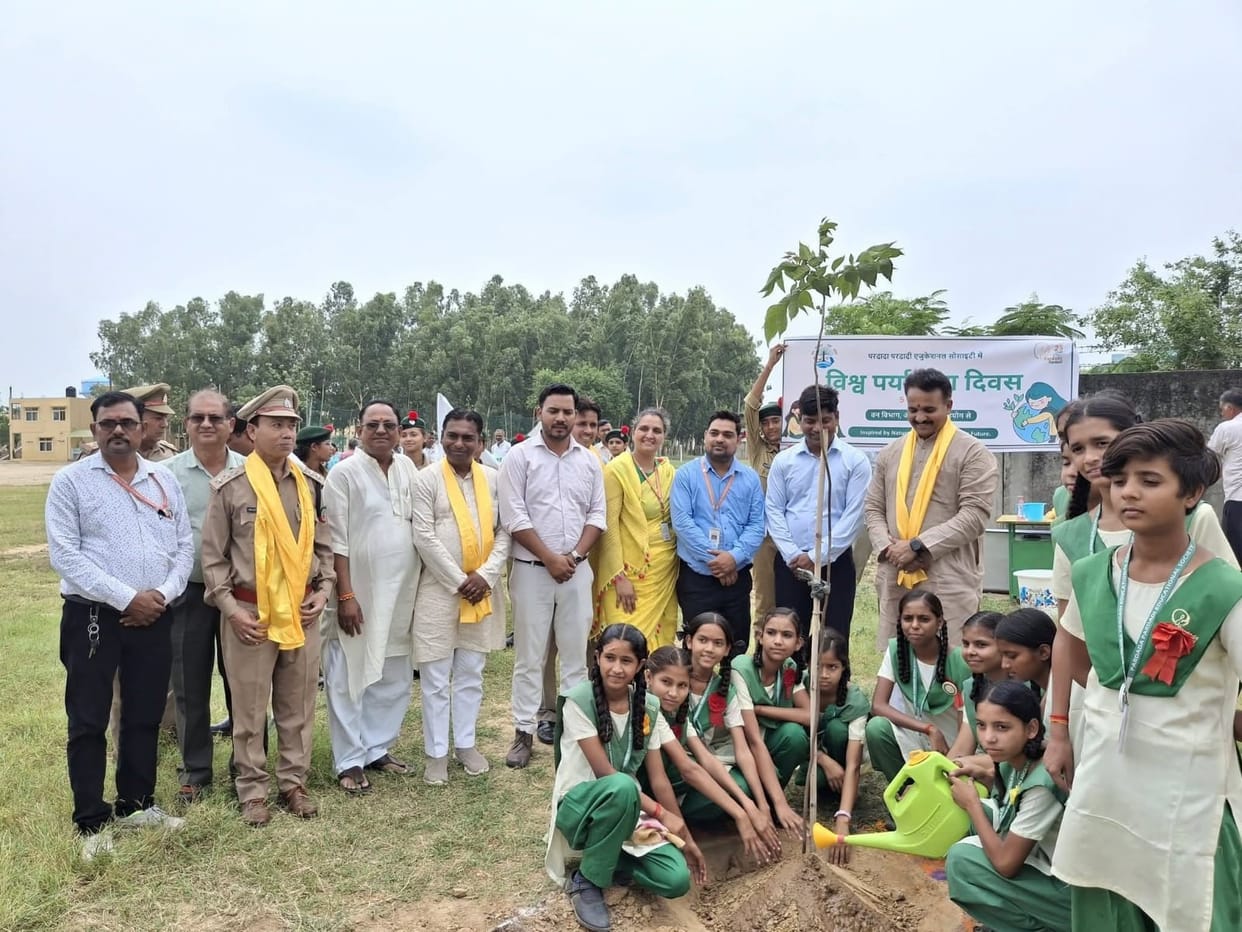 Planting trees and taking a pledge to protect the environment