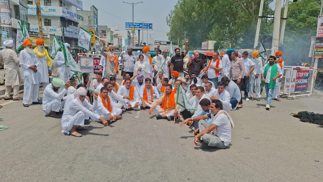 Farmers burnt effigies of the government and Trump and protested.