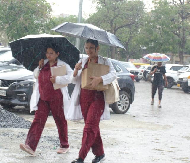 The temperature dropped by 8 degrees due to the rain.