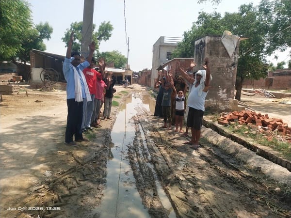 Villagers upset over waterlogging on the road staged a protest