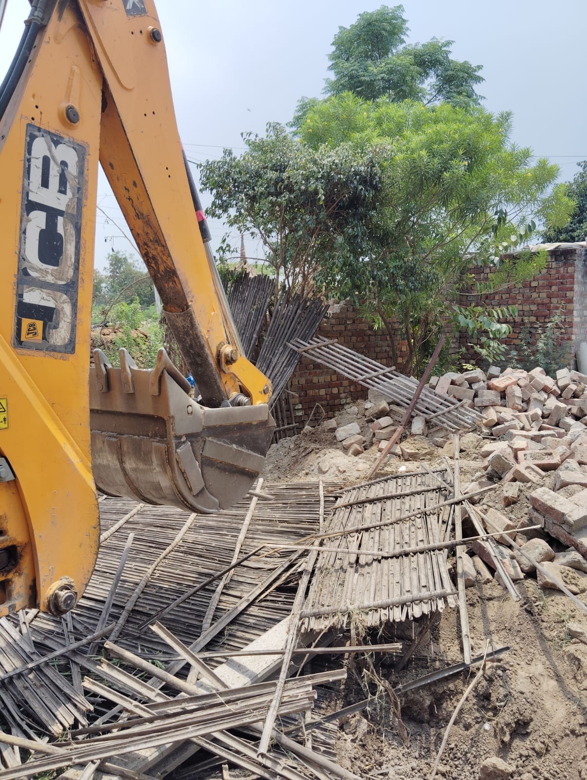 Villagers protested against the team that arrived to remove encroachment on government land.