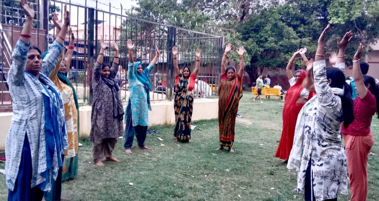Women are improving their health through exercise and yoga