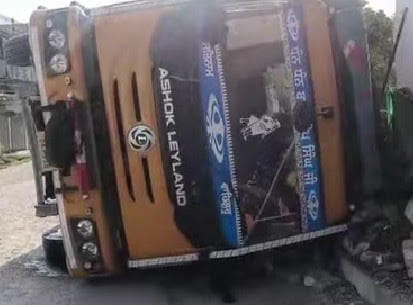 Truck overturned on the road, house and shop damaged