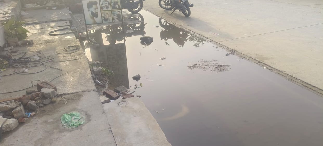 Business on Delhi route hit by waterlogging; questions raised over tile leveling.