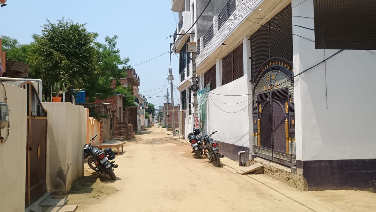Locks hang on the houses surrounding Kamlesh's home; silence prevails in the lanes even on the third day.