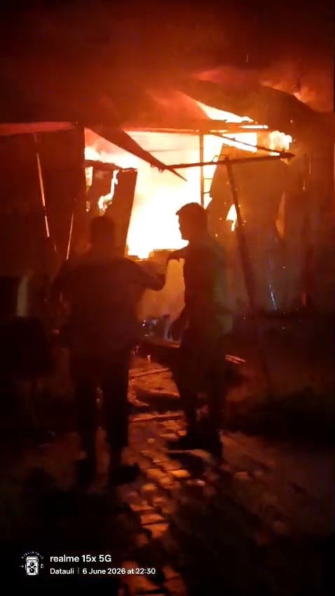 A short circuit caused a massive fire in a grocery store, burning goods worth lakhs.