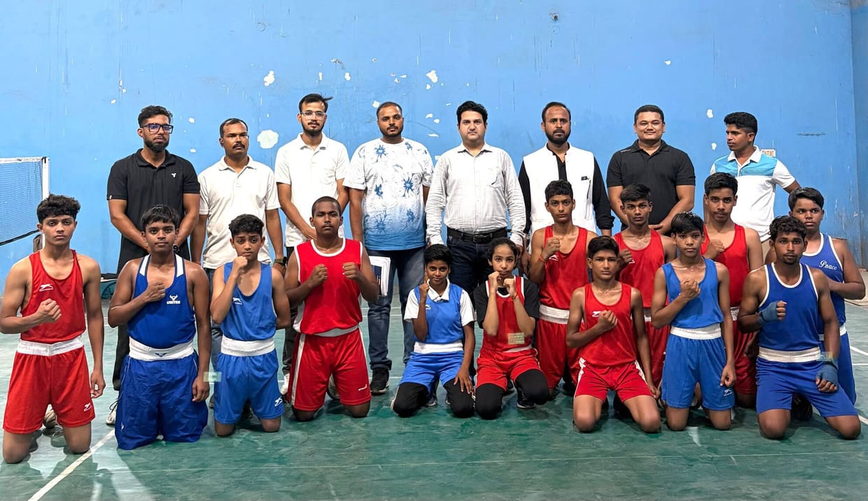 60 boxers appeared for trials; 12 selected for the division.