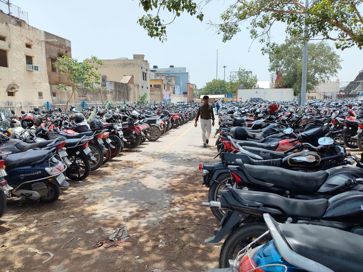 Online payment for railway station parking has been stopped, causing inconvenience to passengers.