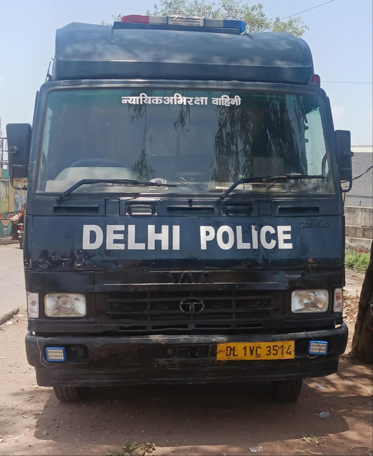 Delhi Police brings murder accused under tight security.