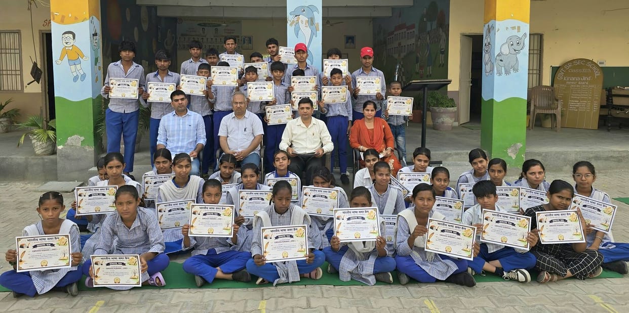 Certificates of appreciation distributed to students.