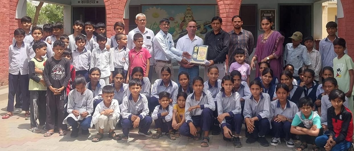 Students were taught the technique of writing the Hindi alphabet correctly.