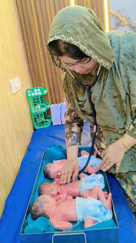 The woman gave birth to three children at once.