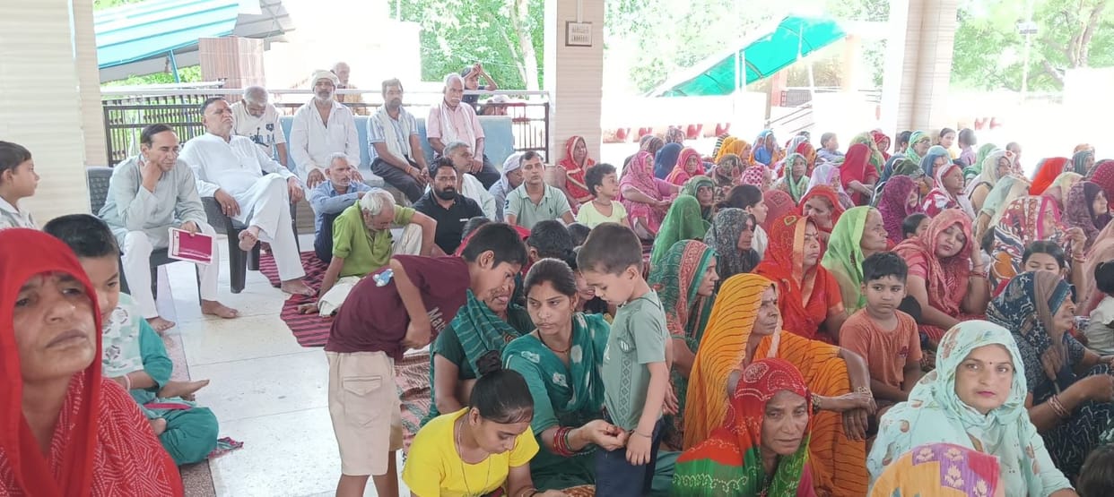 Echoes of Shri Krishna Janmotsav in Dhanaunda; devotees immersed in devotion.