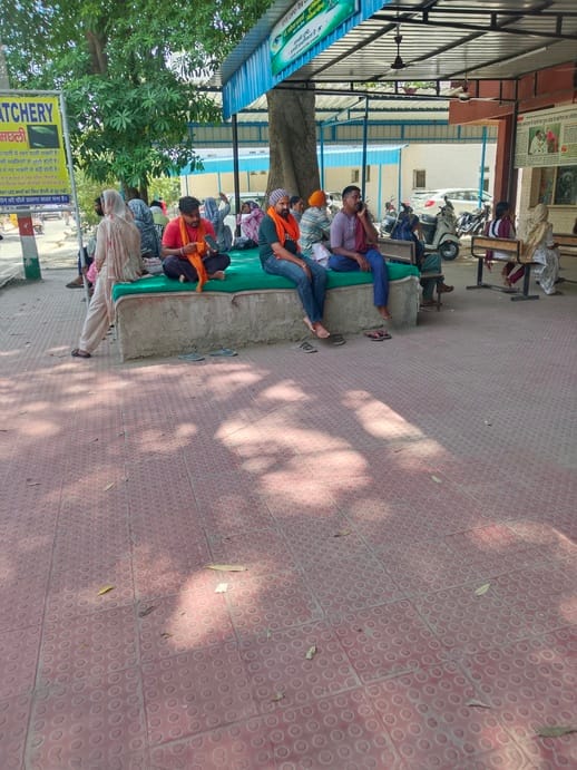 Patients suffered in the heat, seating arrangements were limited in front of the crowd, pregnant women waited in line