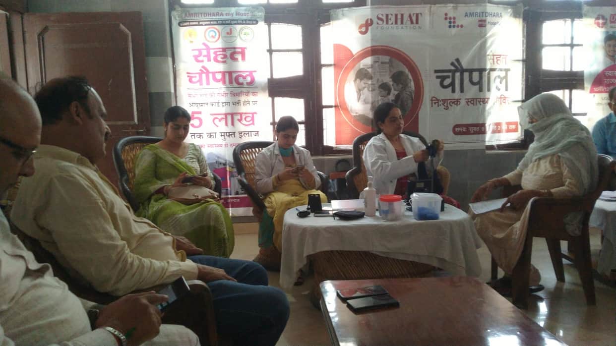 Health check-up of villagers in the camp