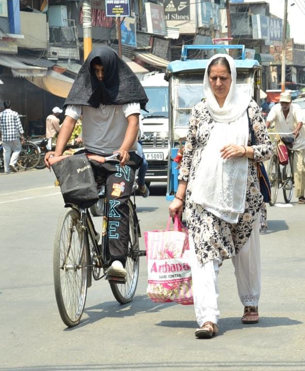 Morning drizzle brought relief, but sweltering, humid heat caused distress in the afternoon.