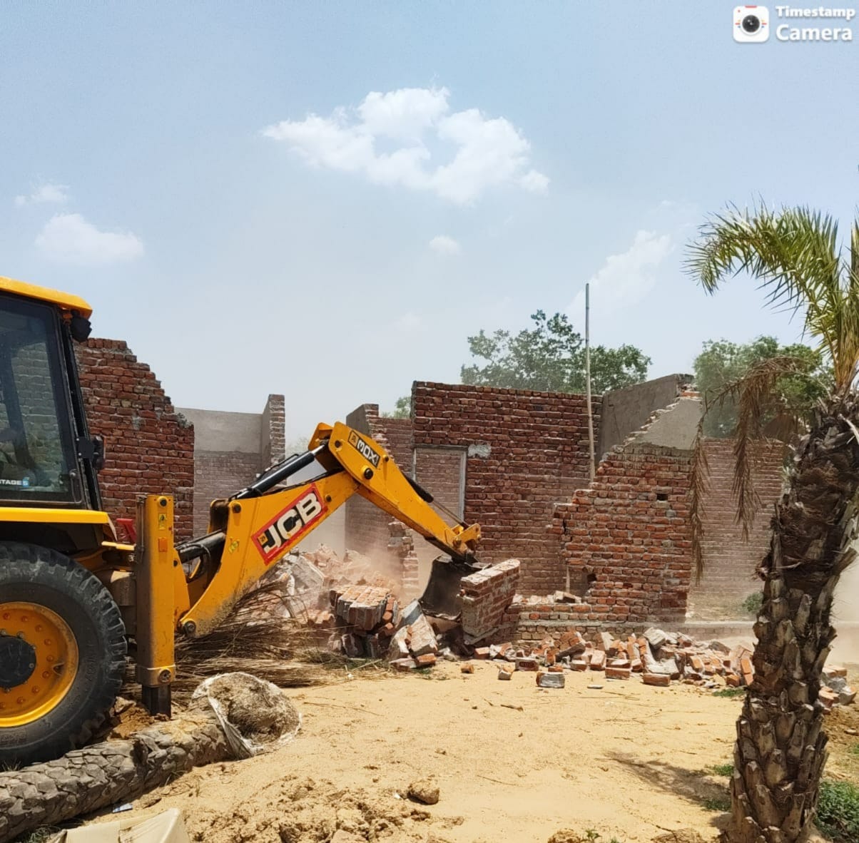 Bulldozer used on illegal construction