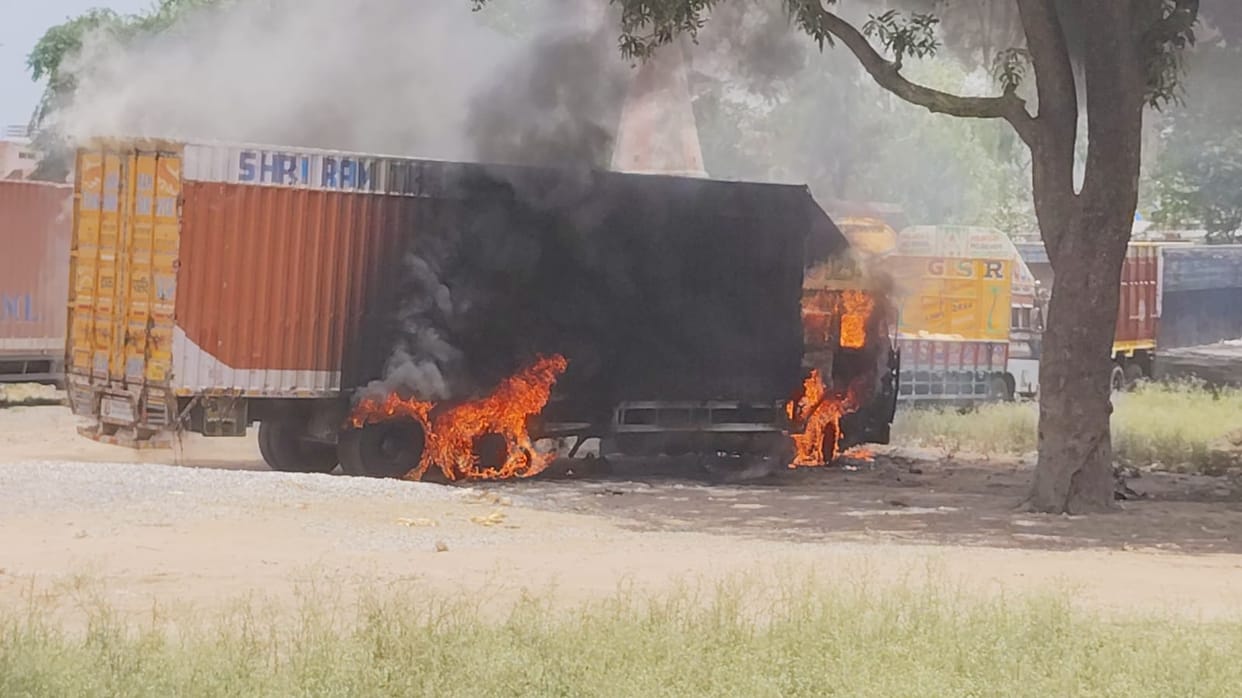 Massive fire breaks out in a sealed container parked near the outpost.
