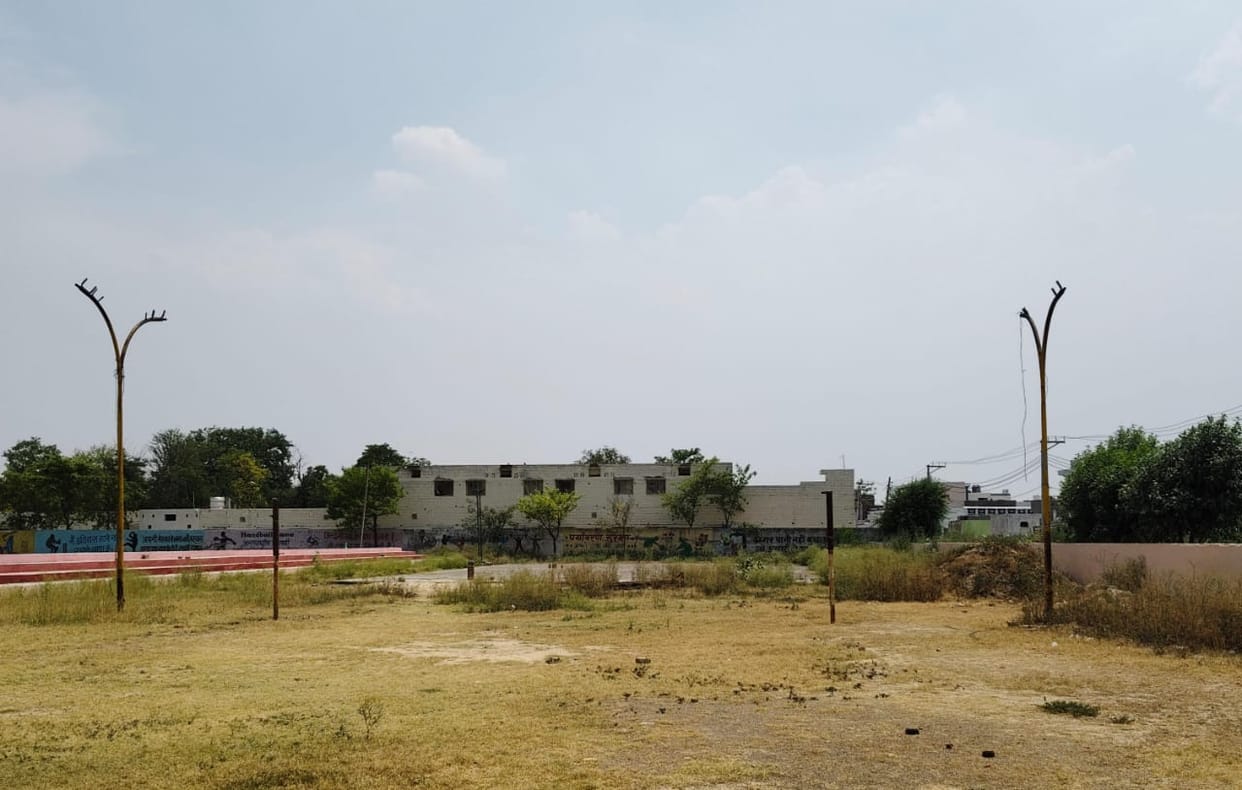Players battling mosquitoes in the eight-acre sports stadium