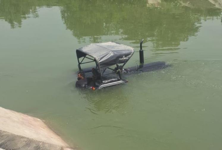 A speeding tractor lost control and fell into a canal.