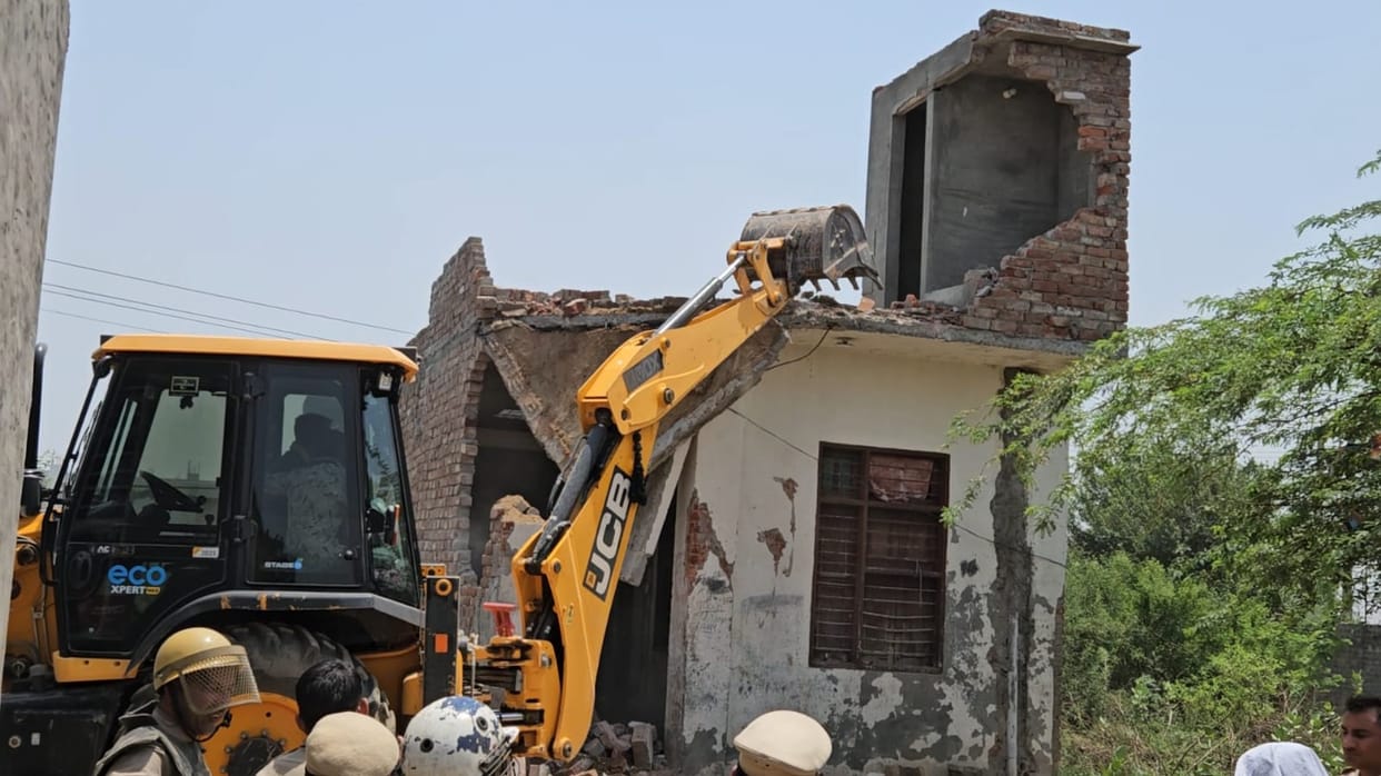 27 illegal houses belonging to drug smugglers demolished with bulldozers in Chamela Colony.