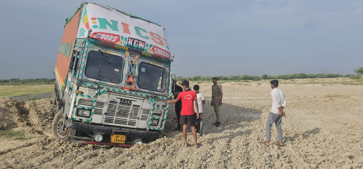 Container found stuck in fields near Bhikhpur.
