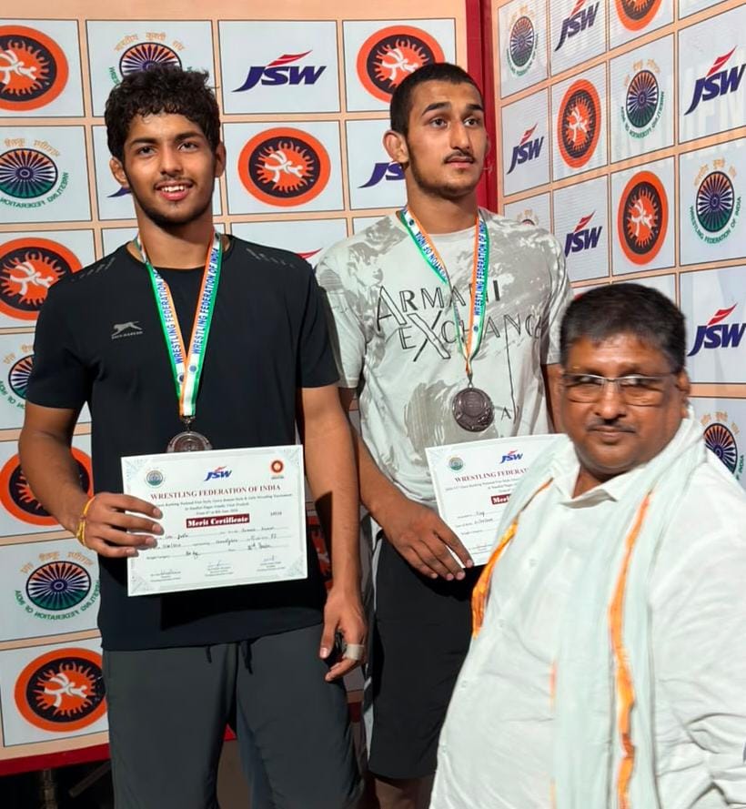 A wrestler from Purkhas village won a medal in a wrestling competition.