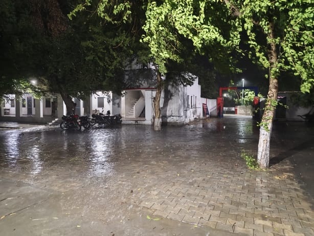 Rain accompanied by a storm late in the evening brought relief from the heat.