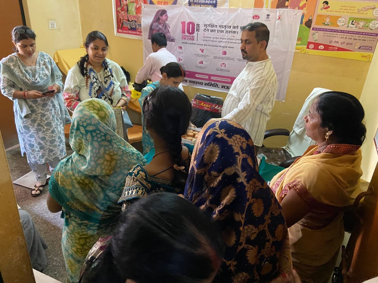 Fruits distributed among women on the completion of 10 years of the campaign.