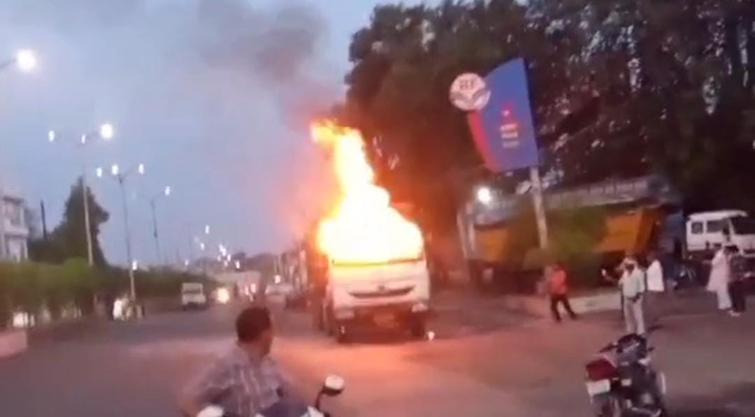Massive fire breaks out in coal-laden truck near petrol pump; chaos ensues.