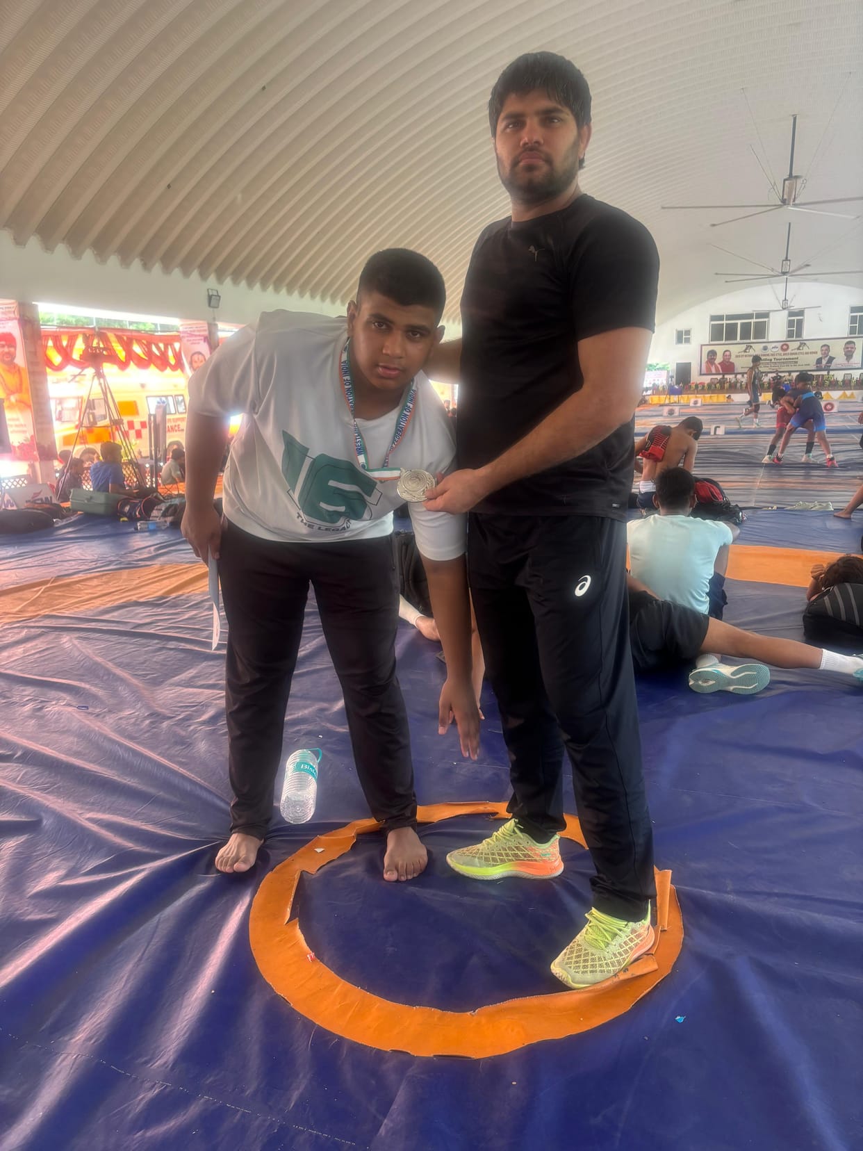Hardik brings glory to the district by winning silver in national-ranking wrestling.