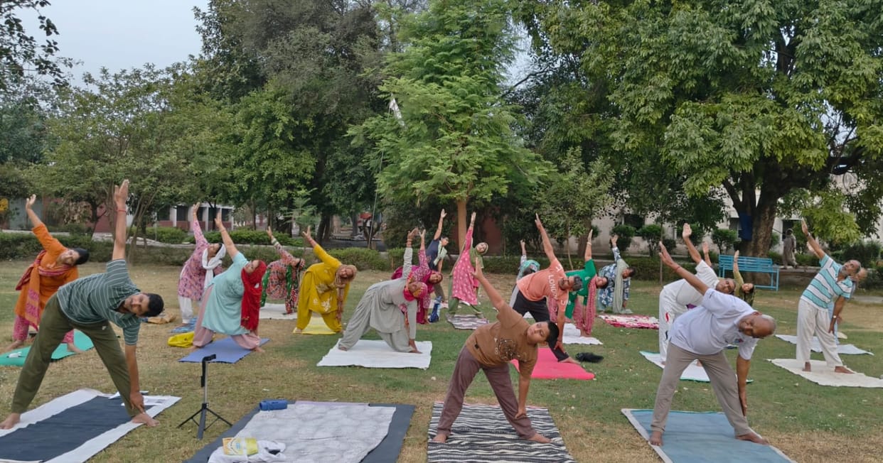 Yoga camp held at ITI campus; benefits of Trikonasana explained.