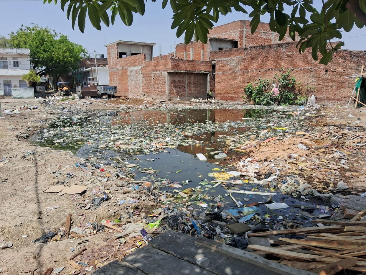 Nayaganj overflowing drains, heaps of garbage