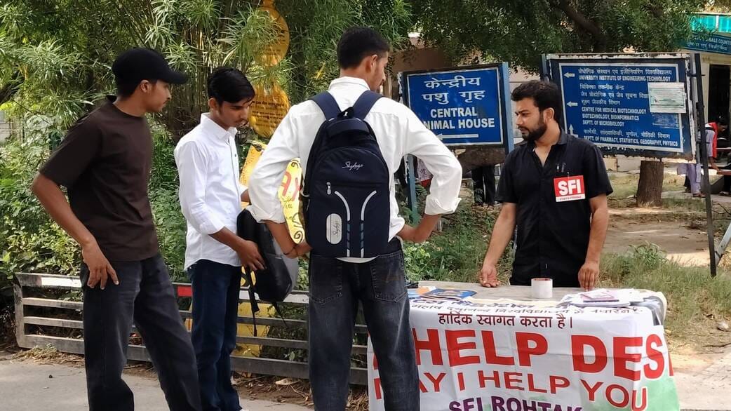 SFI assisted students by setting up a help desk.