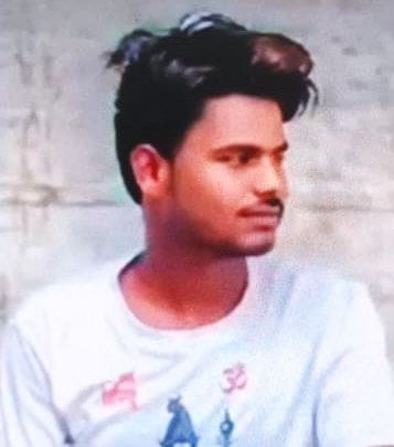 Youth falls from roof onto clothesline in courtyard; dies.