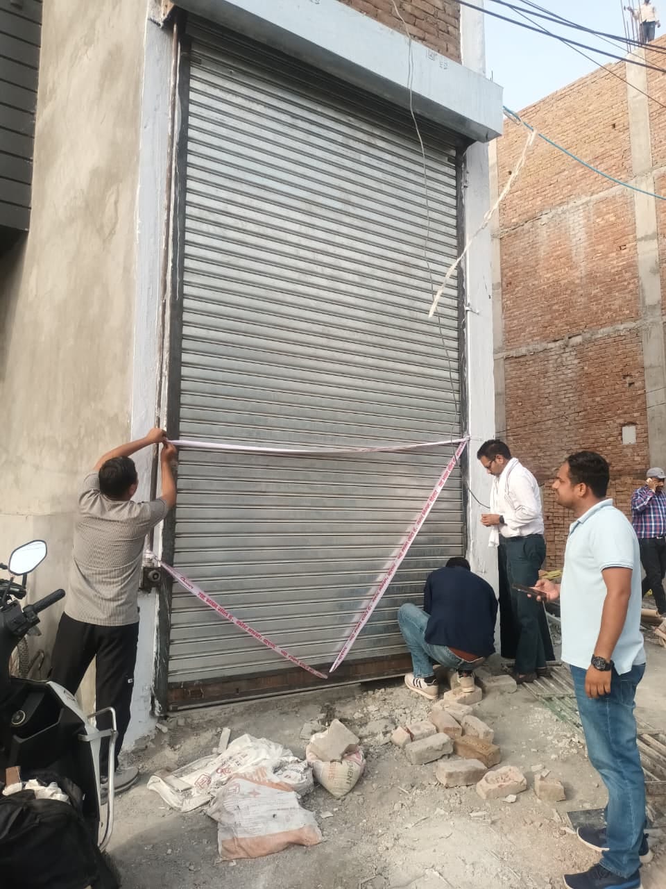 The Municipal Corporation sealed three commercial buildings for violating rules.