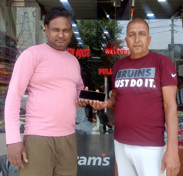 Demonstrated honesty by returning a valuable mobile phone found on the road.