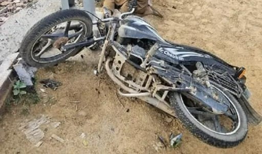Motorcyclist dies after crashing into a pole.